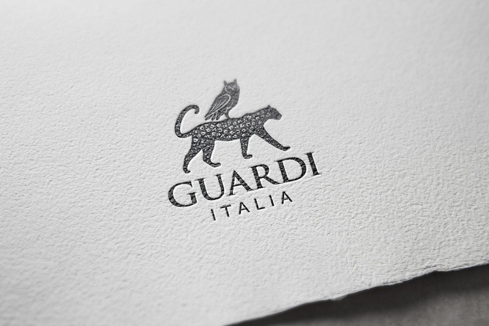 Guardì — letterpress logo on textured paper